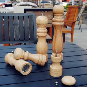 Classic handcrafted wooden manual pepper and salt grinder set in various sizes for kitchen use