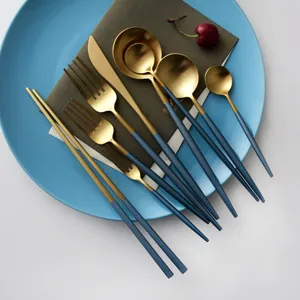 Elegant 304 stainless steel cutlery set in blue and gold with matte handles