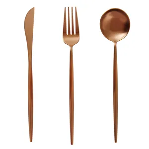 Matte rose gold cutlery set featuring a round handle Portuguese design