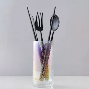Premium matte black stainless steel cutlery set including knife fork spoon and chopsticks