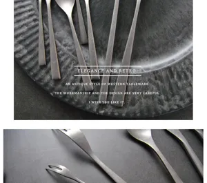 Detailaufnahme von matt-schwarzem, gebürstetem Edelstahl-Besteckset auf einem dunklen Teller