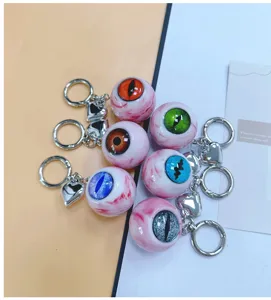 Detailed close-up of Gothic horror eyeball keychains featuring diverse iris colors and bloodshot details