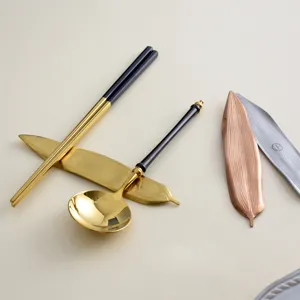 Elegant luxury Japanese leaf-shaped chopstick rest set with golden spoon and chopsticks