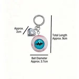 Gothic horror blue evil eye keychain with silver heart charm and size annotations