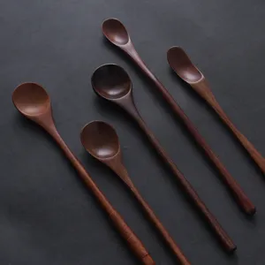 Premium set of five long-handled Japanese-style Nanmu wood spoons for honey stirring