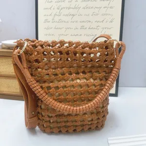 Elegant handmade brown woven PU leather bucket bag with unique mesh texture design
