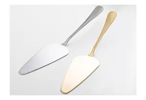 Set of two stainless steel cake servers in gold and silver with serrated edges