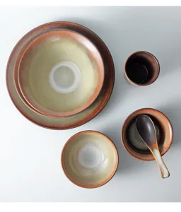 Detailed top view of a Japanese retro ceramic dinnerware set featuring reactive glaze finish