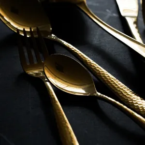 Luxury gold stainless steel cutlery set with hammered texture handle and mirror finish