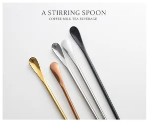 Detailed view of colorful stainless steel long handle stirring spoons for coffee