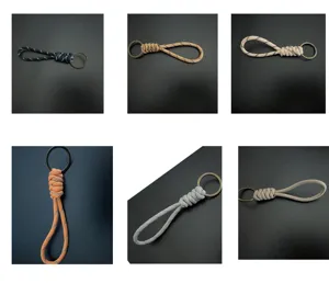 Selection of hand-braided paracord keychains in various colors with metallic ring