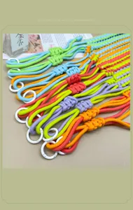 Colorful hand-woven crossbody straps for phone and camera with white rings