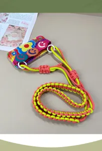 Handmade braided adjustable crossbody phone lanyard in bright pink and lime green neon color