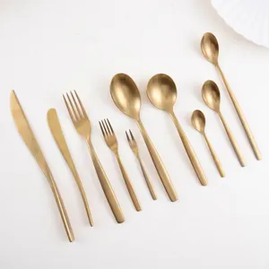 Premium matte gold stainless steel cutlery set including steak knife fork and spoon