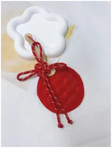 Handmade red bamboo woven fan ornament featuring a traditional Chinese knot detail