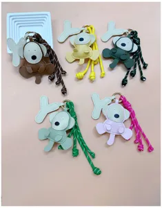 Cute handmade PU leather monkey keychains with colorful braided cords for school bags