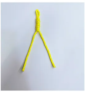 Detailed close-up of a handmade bright yellow woven lanyard for phone cases and keys