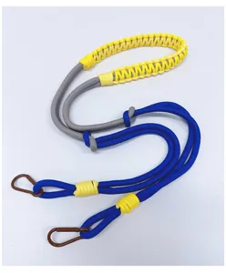 Detailed view of handwoven multi-color paracord crossbody shoulder strap with metal hooks