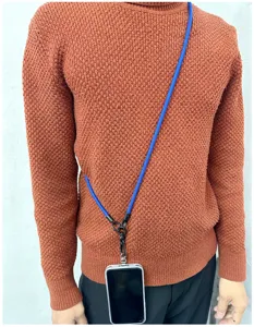 Detail of long blue crossbody phone lanyard with thick rope design and metal clips