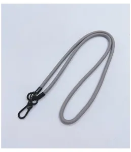 Close-up detail view of grey woven rope lanyard with durable black metal hardware clasp