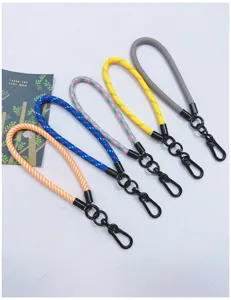 Detailed view of five colorful braided phone wrist straps with durable black metal clasps.