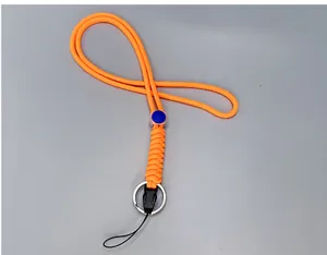 Close-up detail of durable orange braided paracord phone lanyard with blue adjustment bead