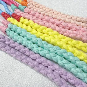 Colorful hand-braided dopamine style phone lanyards and bag straps in soft pastel tones