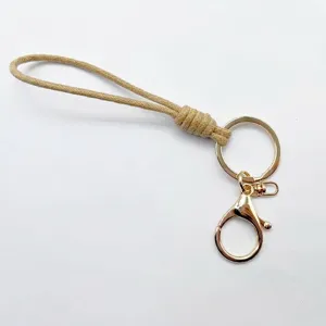 Minimalist braided wax rope keychain with gold metal ring and clasp for car keys