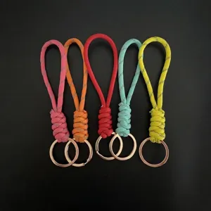 Hand-braided colorful rope keychains for car keys with reflective stripes in five colors.