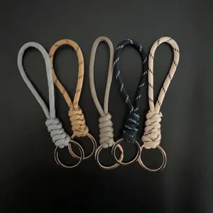 Set of handmade woven paracord keychains in five different colors for car keys and accessories