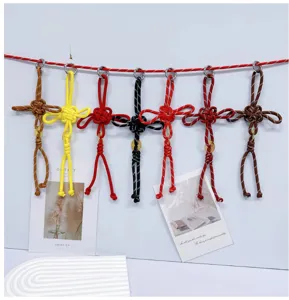 Collection of handmade Chinese knot charms in various colors for bags or keychains
