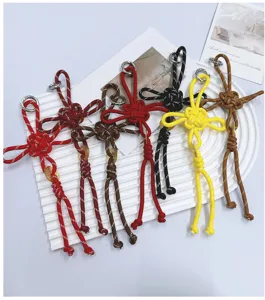 Handmade braided Chinese knot charms in various vibrant colors for bags and keychains