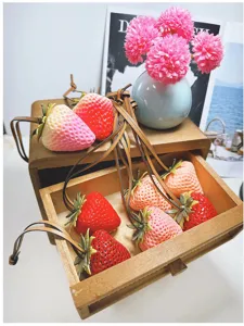 Large realistic 3D strawberry bag charms in various pink and red shades