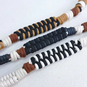 Handmade woven cotton rope bag straps in stylish black, white, and earthy brown tones