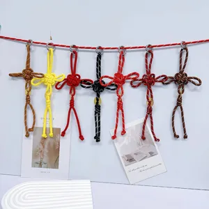 Set of colorful handmade woven Chinese knot bag charms and keychains in traditional style