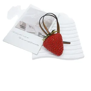 Realistic 3D large strawberry bag charm accessory with brown faux leather strap hanging