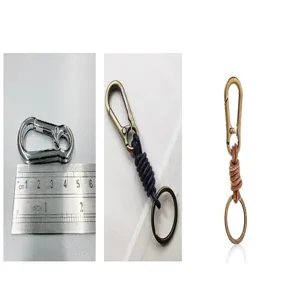 Close-up of vintage leather woven keychains with scale ruler for size reference