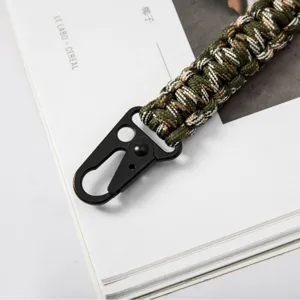 Handmade 7-strand paracord keychain with a durable black metal eagle beak hook for outdoors