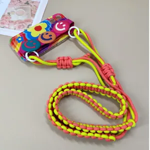 Handmade colorful woven phone strap with adjustable length and cute smiley face charms.