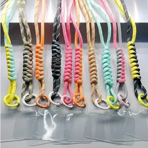 Colorful braided phone wrist lanyards with transparent tether tabs and metal rings