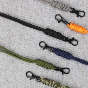 Handmade paracord lanyard with durable metal clasp for keys and ID cards, multiple colors.