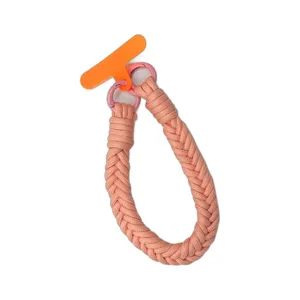 Pink braided mobile phone wrist strap with orange connector insert card for women