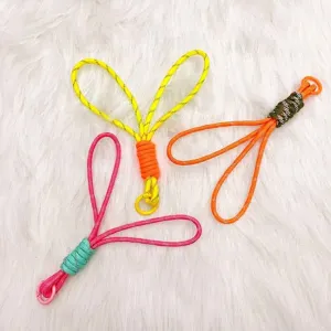 Set of colorful handmade braided paracord keychains with reflective patterns for bag