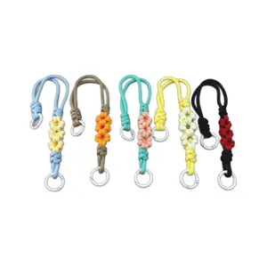 Set of hand-braided daisy floral phone wrist straps with white metal ring clips