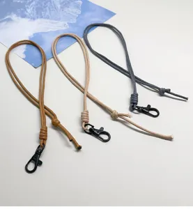 Three colors of waxed cord lanyards with black lobster clasps for ID badges.
