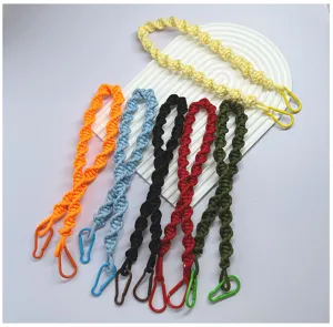 Detailed view of colorful handmade braided shoulder straps for bags and camera replacement