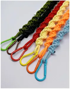 Detailed view of colorful braided paracord bag straps with matching metal carabiners
