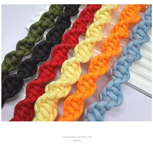Detailed view of colorful handcrafted spiral woven straps for crossbody bags and cameras
