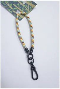 Close-up detail of a thickened colorful braided phone wrist strap with heavy-duty black metal clip