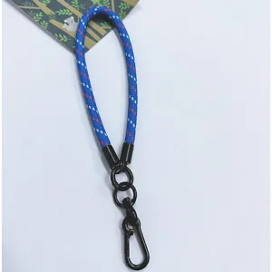 Detail view of a durable blue thick woven wrist lanyard with black metal lobster clasp